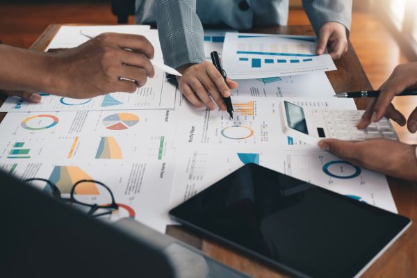 Business team assessing training effectiveness data