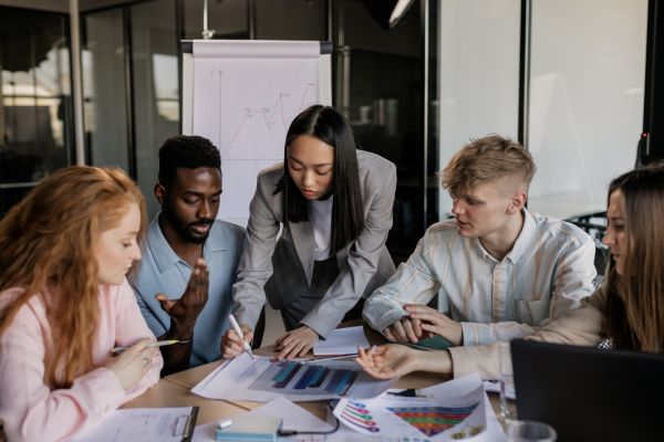  Diverse team engaged in a strategy meeting.
