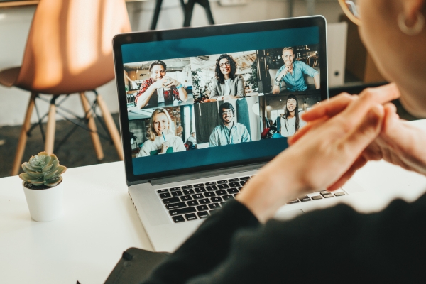 Employees participating in an online corporate collaboration challenge.
