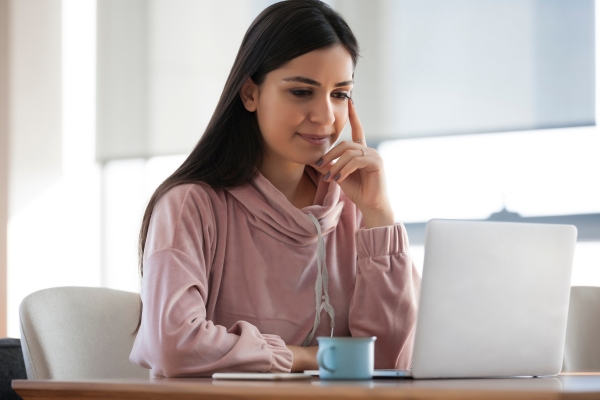 Person using HRDF’s online system to file a training grant claim.